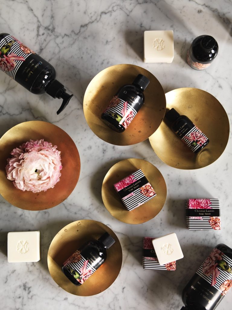 Bath amenities arranged on a marble top